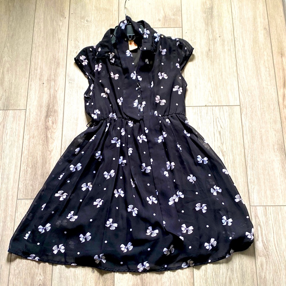 Black casual dress with White Butterflies, with a making belt.
